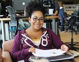 Young female sitting at desk